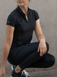 Issette High waisted high-waisted black trousers.