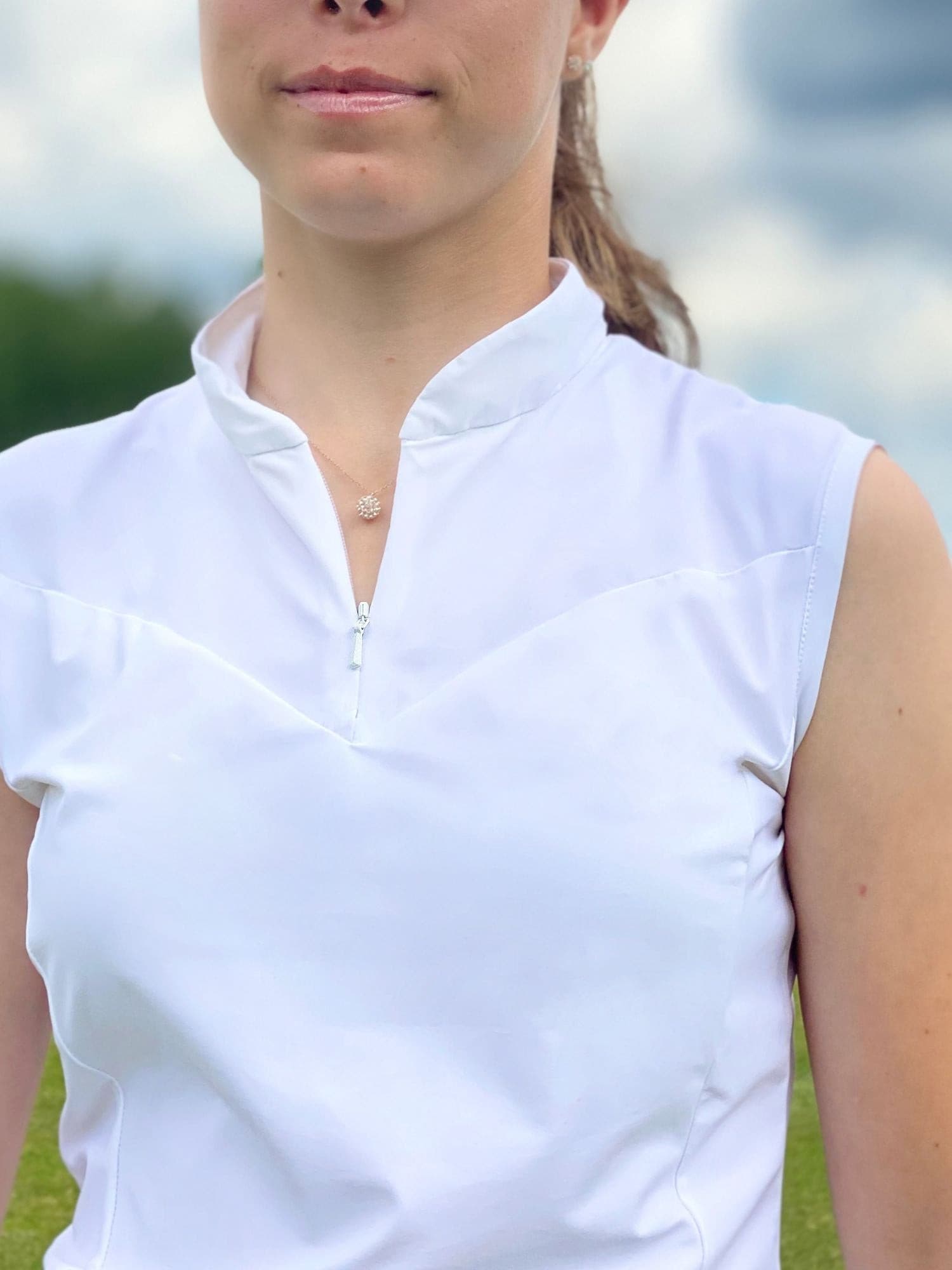 Ladies white on sale sleeveless golf shirts